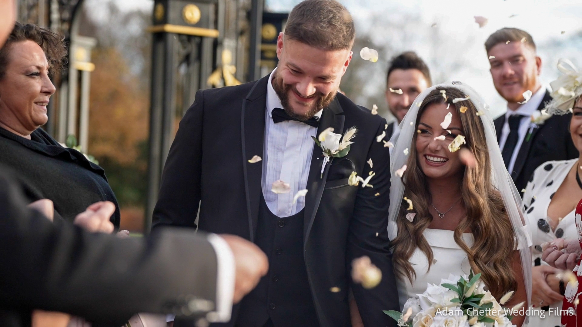 Bride and Groom Have Confetti Thrown At Them Bride and Groom Have Confetti Thrown At Them