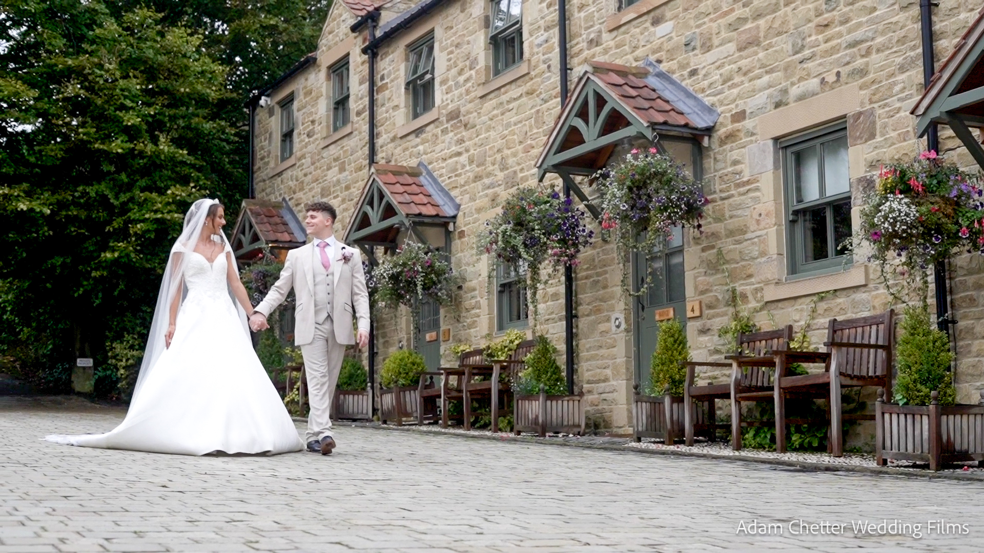 Bride and Groom Walking Past Red Row Bride and Groom Walking Past Red Row