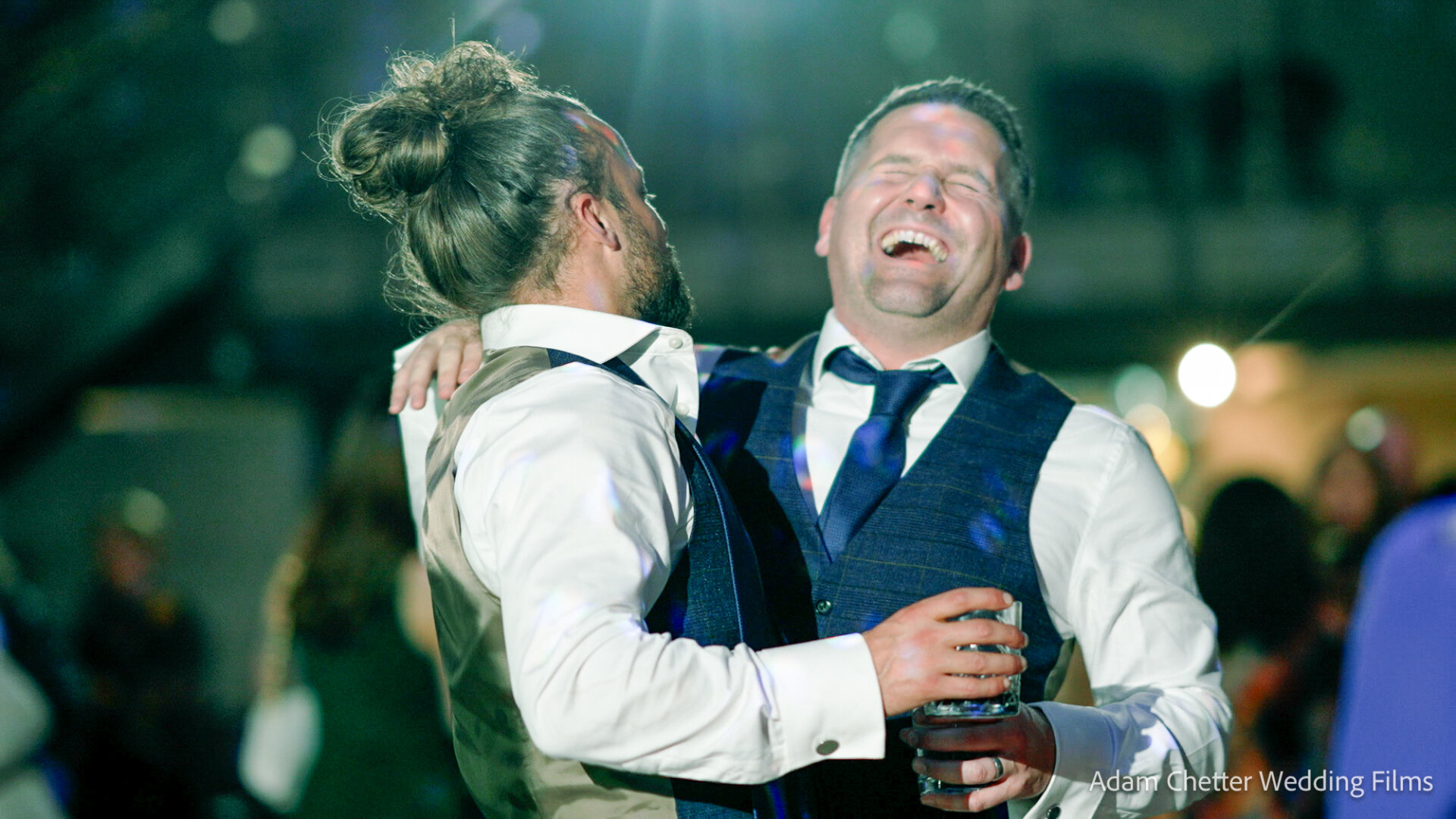 Groomsmen Looking Happy On Dance Floor
