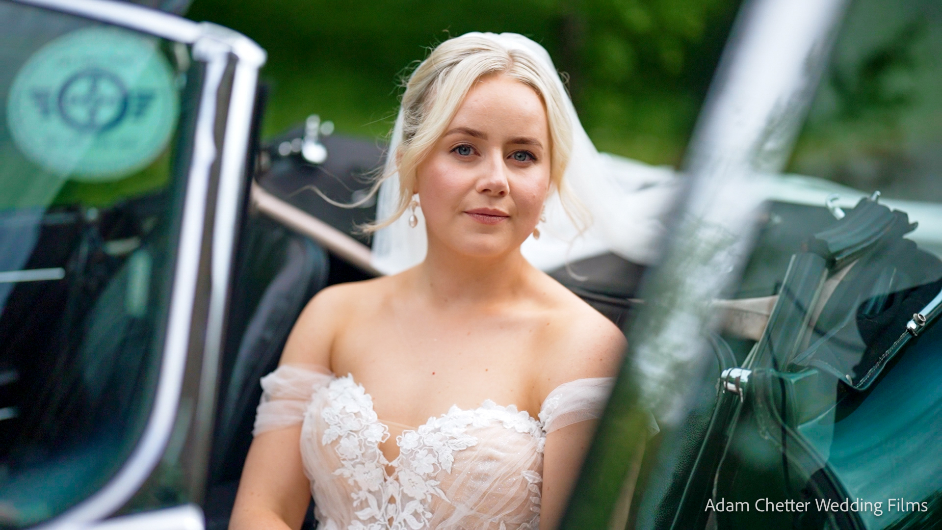 Bride Mollie Sits In Green Vintage Car