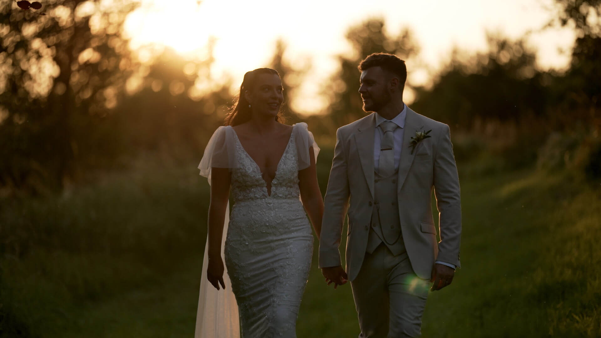 Bride and Groom in Gardens at Sunset